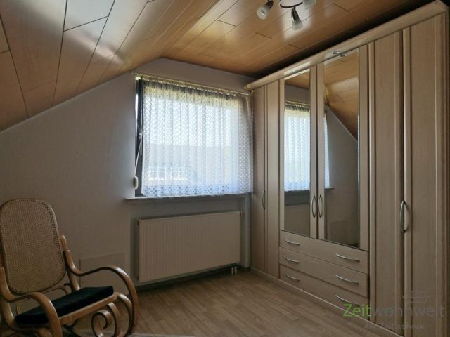 verspiegelter Kleiderschrank