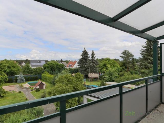 überdachter Balkon zum Garten