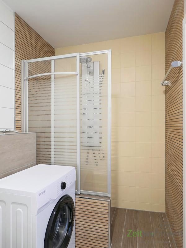Waschmaschine und bodentiefe Dusche