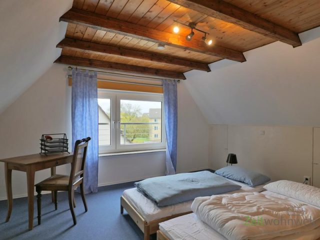 Dachzimmer moit Gästebetten