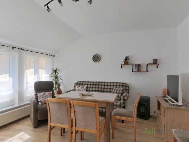 Wohnzimmer-Sitzecke und TV